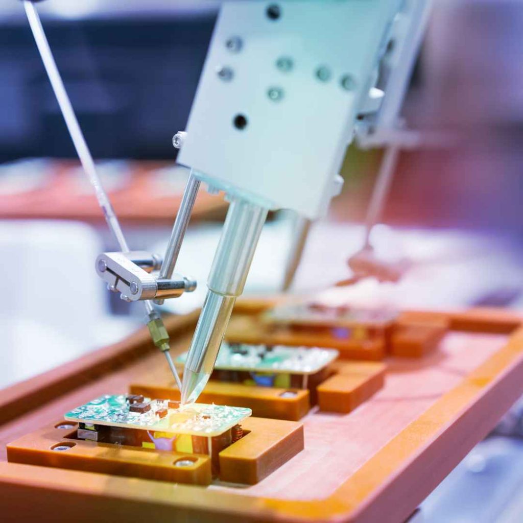 BENCOR utilizes automated soldering machines, shown in this image, to reduce labor costs and increase precision in PCB assembly.