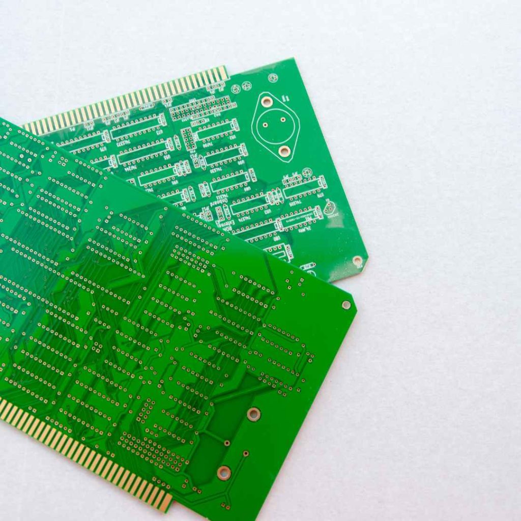 Image of standard green PCBs, symbolizing the evolution of circuit board technology explored in BENCOR's blog on future PCB trends.