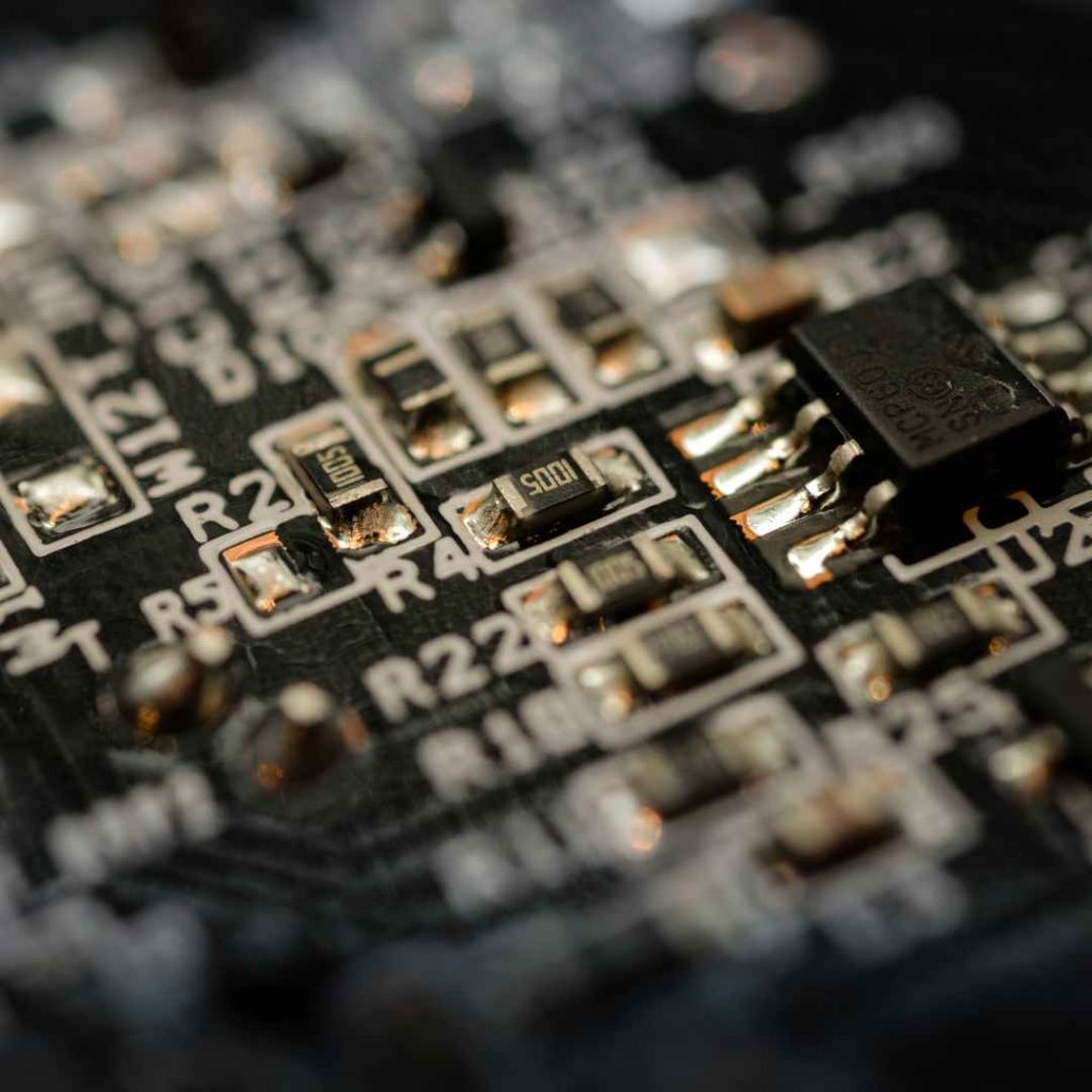 Macro image of a prototype board's dense circuitry and surface-mount components, illustrating the crucial details involved in bringing a product concept to reality.